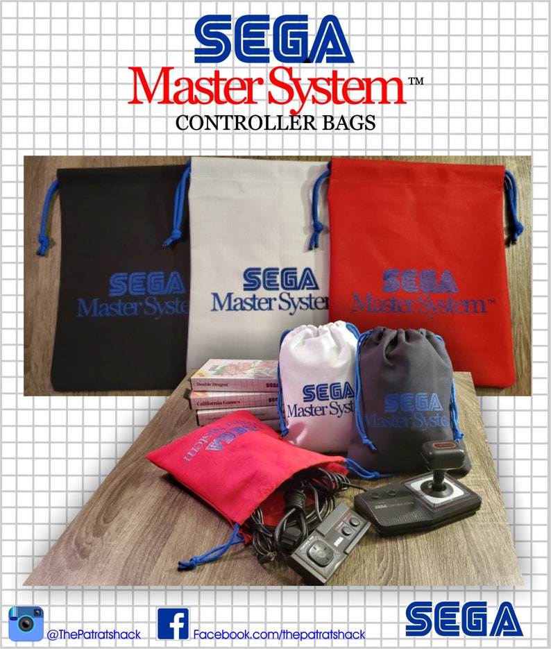 May include: A collection of drawstring bags in black, white, and red, each featuring the blue Sega Master System logo. The set includes large flat bags and smaller pouches, with some shown containing black video game controllers and game cartridges.