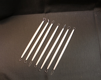 Juego de herramientas de cinta con extremo de alambre de aluminio y acero inoxidable para trabajos de precisión.