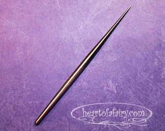 Round stainless steel sculpting tool
