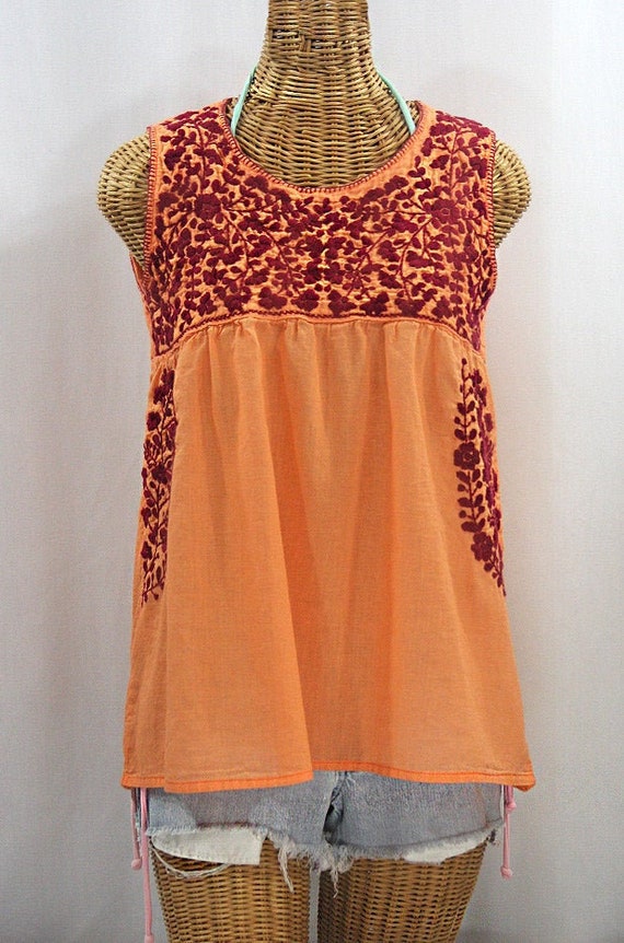 sleeveless peasant top