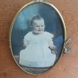 Antique Tinted Baby Photo Metal Decorative Oval Ornate Brass Frame Hand Tinted Colored White Dress Smiling Nursery Picture Wall Hanging image 3