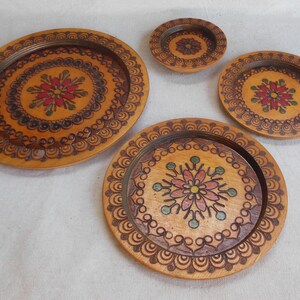 Vintage Handmade Woodburned Plates Pyrography Set of 4 Nesting Plates Wooden Folk Art Traditional Polish Poland Craft Wall Plaques Wall Art