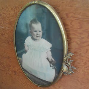 Antique Tinted Baby Photo Metal Decorative Oval Ornate Brass Frame Hand Tinted Colored White Dress Smiling Nursery Picture Wall Hanging image 4