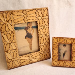 May include: Two decorative wooden picture frames. The frames are made of small, light-colored wooden pieces arranged in a geometric pattern. One frame is larger and rectangular, while the other is smaller and square. Each frame holds a vintage photograph.