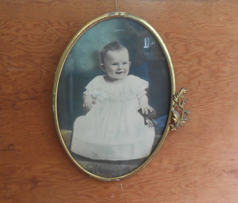 Antique Tinted Baby Photo Metal Decorative Oval Ornate Brass Frame Hand Tinted Colored White Dress Smiling Nursery Picture Wall Hanging image 1