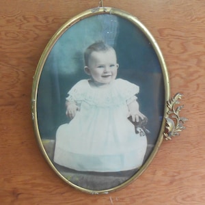 Antique Tinted Baby Photo Metal Decorative Oval Ornate Brass Frame Hand Tinted Colored White Dress Smiling Nursery Picture Wall Hanging image 2