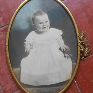 Antique Tinted Baby Photo Metal Decorative Oval Ornate Brass Frame Hand Tinted Colored White Dress Smiling Nursery Picture Wall Hanging image 5