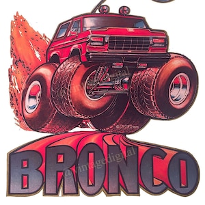 May include: A red Ford Bronco 4x4 monster truck with large tyres driving on a red dirt track. The truck has a yellow flag with the text "4x4" on it. The text "BRONCO" is in gold letters on a red background.