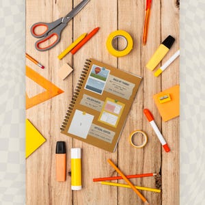 Graphic Designer's Notebook for project planning, logo sketches and layout design.