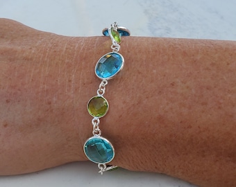Caribbean Lagoon: Bright Blue Topaz and Shimmering Peridot Bracelet