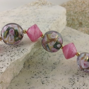 Girly Pink with an Edge: Murano Bed of Roses beads with splashes of 24k gold and creamy pink bicone Murano glass bracelet.