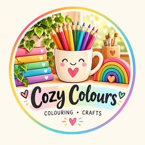 May include: A circular logo featuring a white mug with a smiling face and pink heart, filled with colorful pencils. Beside it are stacked books, a rainbow, and a plant. The text reads Cozy Colours COLOURING &bull; CRAFTS with heart accents.
