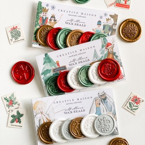 May include: Three sets of self-adhesive wax seals with Christmas themes. The first set features a nutcracker and a ballerina, the second set features a reindeer and a North Pole sign, and the third set features a nativity scene. Each set includes six wax seals in various colors, including red, green, gold, and white.
