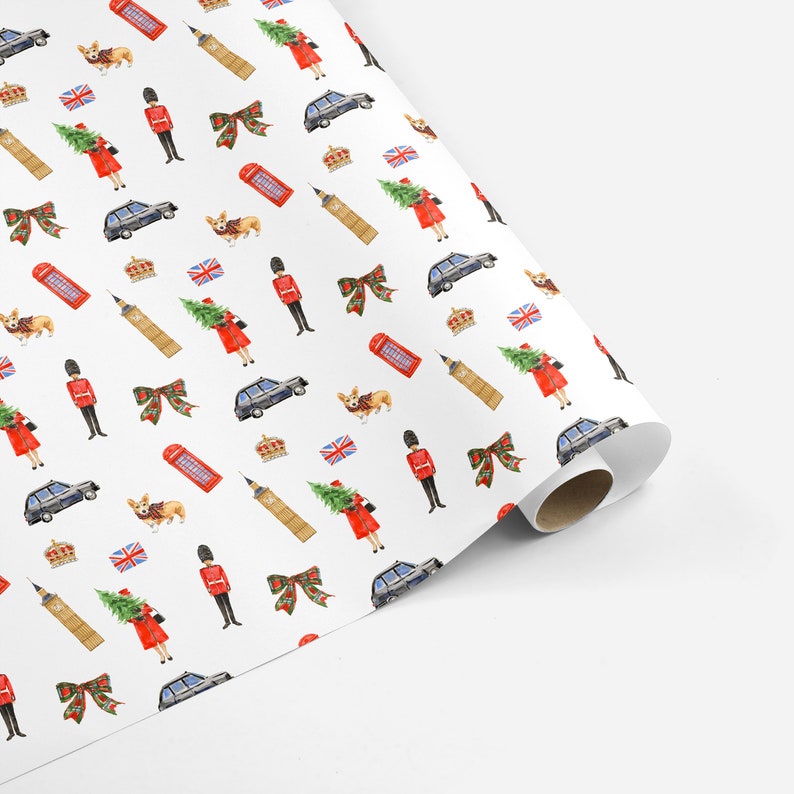 May include: White wrapping paper with a repeating pattern of British icons. The design includes red telephone boxes, corgi dogs, Big Ben, black cabs, Union Jacks, crowns, and soldiers in red coats. A festive and whimsical design.