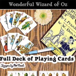 May include: A full deck of playing cards featuring illustrations from the book "The Wonderful Wizard of Oz". The cards feature characters like Dorothy, the Scarecrow, the Tin Man, and the Cowardly Lion. The back of the cards features a sunflower design.