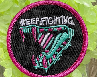 Keep Fighting trans pride patch
