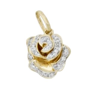 May include: A gold rose pendant with clear sparkling diamonds. The rose is detailed with a swirl design and is a delicate piece of jewelry.