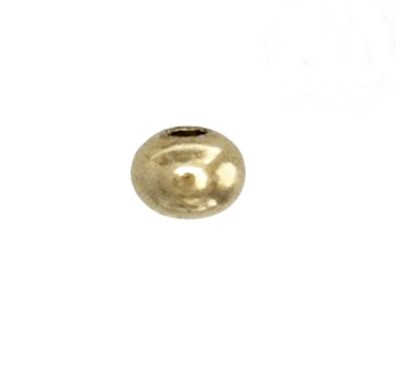 May include: A single gold-colored round bead.
