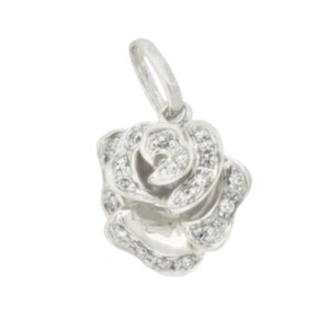 May include: A silver rose pendant with clear cubic zirconia stones.