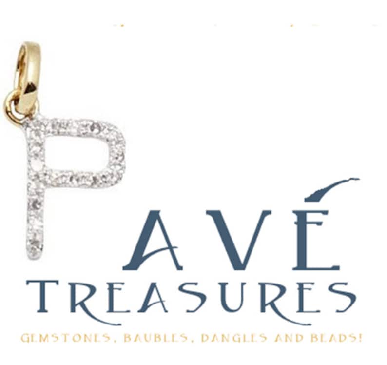 May include: A gold pendant charm in the shape of the letter P, set with small diamonds. The charm is hanging from a gold chain. The charm is part of a jewelry collection called "Ave Treasures: Gemstones, Baubles, Dangles and Beads!"