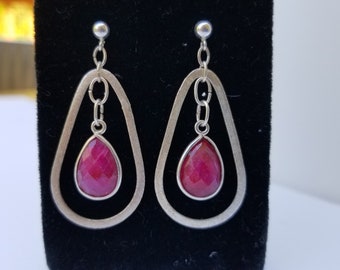 Handmade sterling silver teardrop-shaped dangle earrings with teardrop Red Ruby