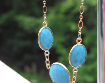 Handmade 16.5"  necklace of gold-filled chain  and 3 bezel-set Turquoise cabochons.