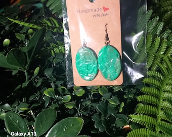 Green polymer clay earrings.