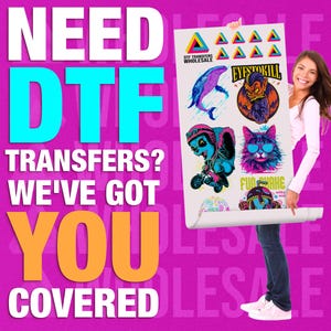 Puede incluir: Una mujer sostiene un cartel con el texto "DT Transfers? We've got you covered" y una variedad de diseños gráficos coloridos. El cartel está enrollado en la parte inferior. El texto "DT Transfers Wholesale" también es visible en el cartel.