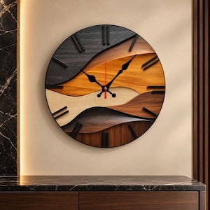 May include: A round wall clock featuring a layered, multi-toned wood design with wavy, organic sections in black, light tan, and various shades of brown. It has black hour and minute hands, a thin red second hand, and black stick markers.