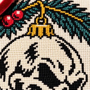 Macro of the stitched skull grin and gold ornament cap