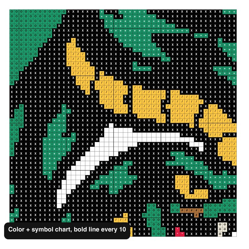 May include: A cross-stitch pattern chart featuring a grid with black, green, yellow, and white squares marked by symbols. The design includes a black background, green foliage shapes, yellow accents, and white lines. Text reads: Color + symbol chart, bold line every 10.