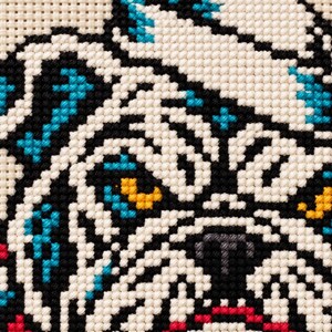 Macro of the stitched bulldog face and underbite