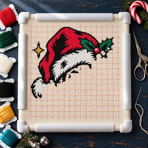 Santa skull cross stitch in progress in a Q-snap frame