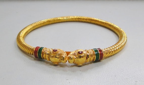 Gold bangles shop with enamel