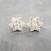 see more listings in the Earring section