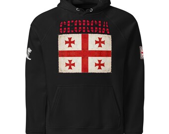 May include: A black hooded sweatshirt featuring the word GEORGIA in bold red letters above a white flag with a red cross and four smaller red crosses. A white lion emblem is on the right sleeve and a small flag patch is on the left sleeve.