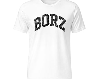 May include: A white short-sleeve t-shirt featuring the word BORZ printed in a black, distressed, arched varsity-style font across the chest. The garment has a classic crew neckline and a straight hemline, providing a clean look.