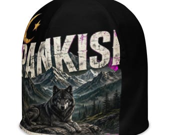 May include: A black beanie featuring a graphic print of a gray wolf resting on a rock in front of a mountain range. The design includes a golden crescent moon and star symbol, along with the white distressed text PANKISI printed across the top.