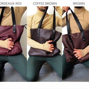 May include: Three leather tote bags in different colors: Bordeaux red, coffee brown, and brown. Each bag has black straps and a zipper closure.