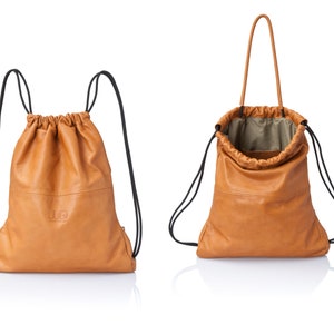 2-in-1 Convertible tan leather drawstring bag Handmade unisex travel leather backpack in soft camel brown Leather Camel