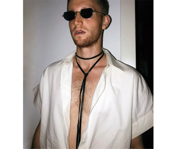 【TOGA】Leather belt fringe loop tie TOGA（トーガ）の「【TOGA TOO/トーガトゥ】Leather belt fringe