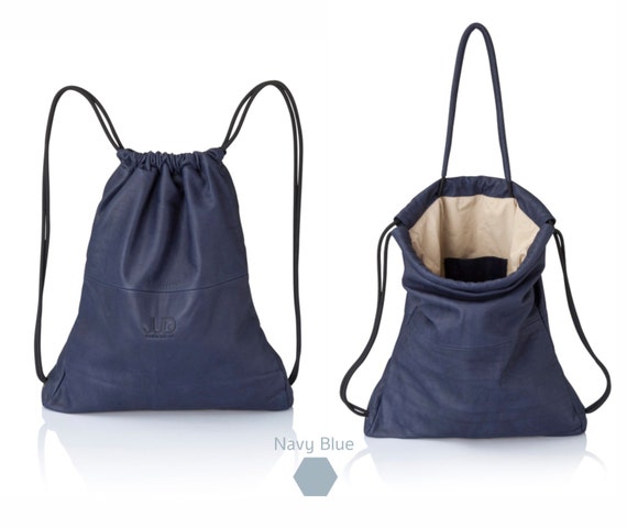 Bolso Canvas Convertible En Mochila Azul Marino Mujer