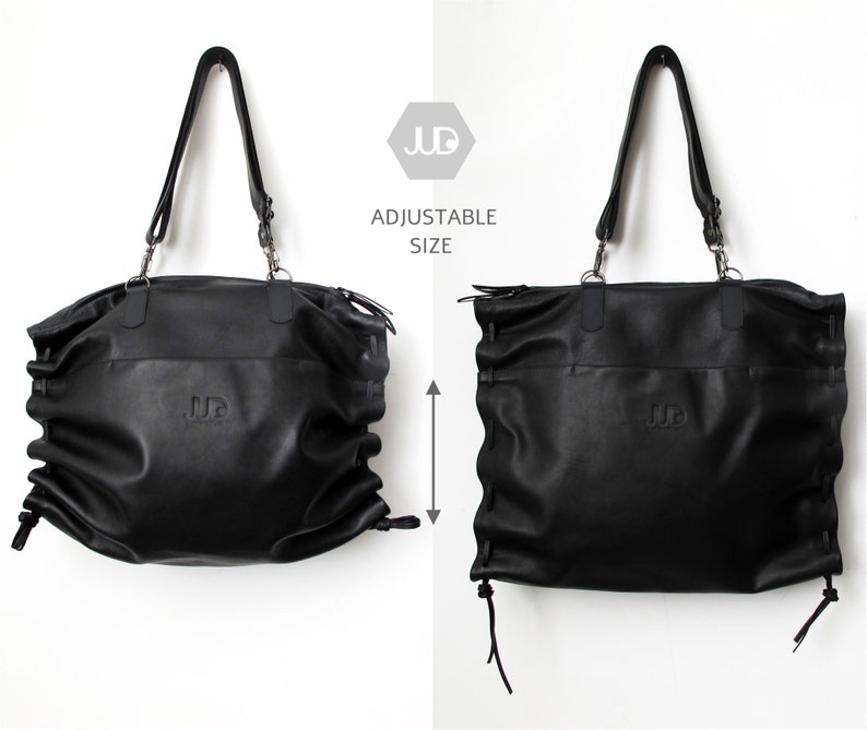 May include: Black leather tote bag with adjustable straps and a drawstring closure. The bag has a logo that says "JUD" on the front.