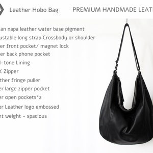 May include: Black leather hobo bag with a long adjustable strap. The bag has a front pocket with a magnetic closure, a back pocket, and a fringe puller. It features a YKK zipper and an embossed leather logo.  PREMIUM HANDMADE LEATHER.