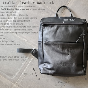 May include: Black leather backpack with adjustable shoulder straps, a zipper closure, and multiple pockets. The backpack measures 15.74 inches tall, 11.8 inches wide, and 4.33 inches deep.