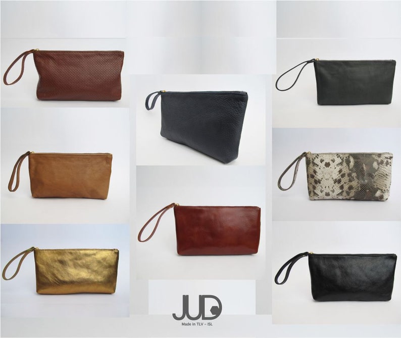 May include: A set of ten leather clutches in various colors and patterns, including brown, tan, black, gold, and a snakeskin print. The clutches have a zipper closure and a small handle.