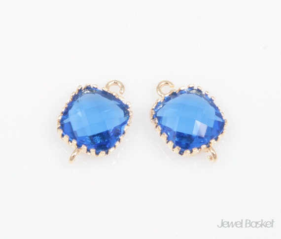 Un par de azul cobalto cristal oro plateado clip en forma de lágrima pendientes.