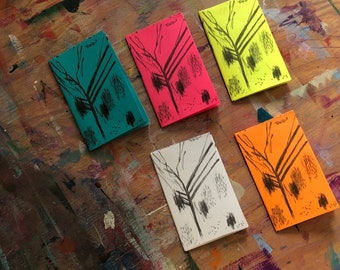 May include: Five small cards with black ink drawings of trees on different colored backgrounds. The cards are labeled "Trees 2". The colors are teal, pink, yellow, orange, and white.