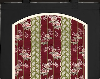Può includere: Una borsa tote nera con una grafica rettangolare centrata e parte superiore ad arco. La grafica mostra un motivo ripetuto di bande verticali smerlate color verde oliva alternate a strisce rosso scuro decorate con motivi floreali.