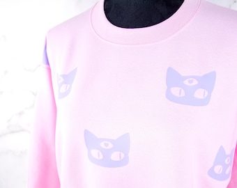 pink pastel goth oversize cute and comfy winter sweater -  funny kawaii larme sweatshirt 3 eyed alien cat fairy kei jumper